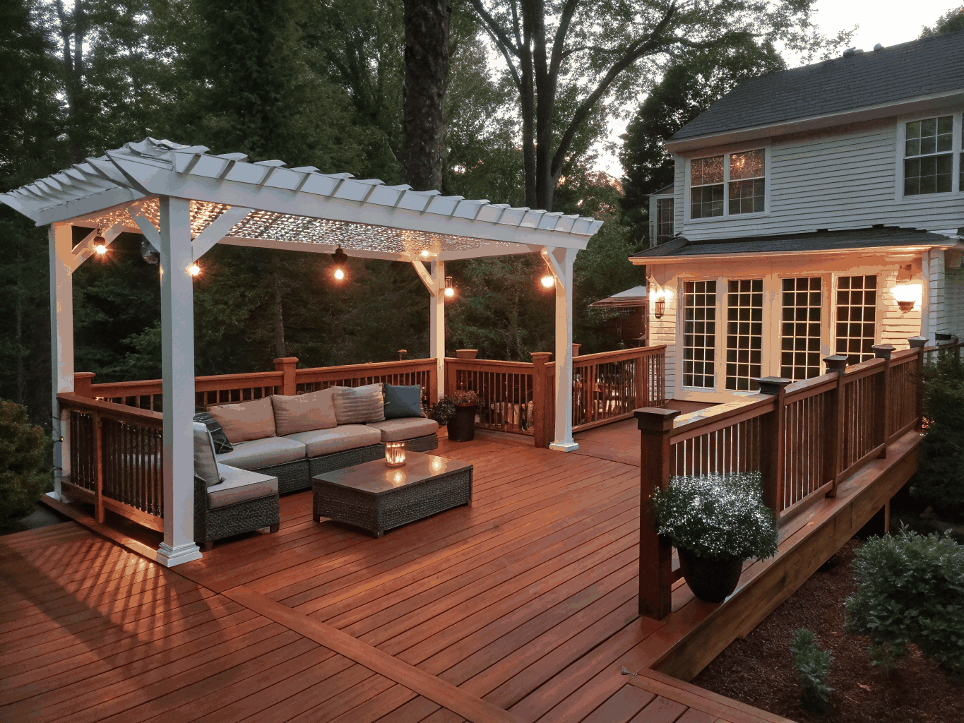 Finished Georgia outdoor living space with exposed cedar trusses and stacked stone fireplace
